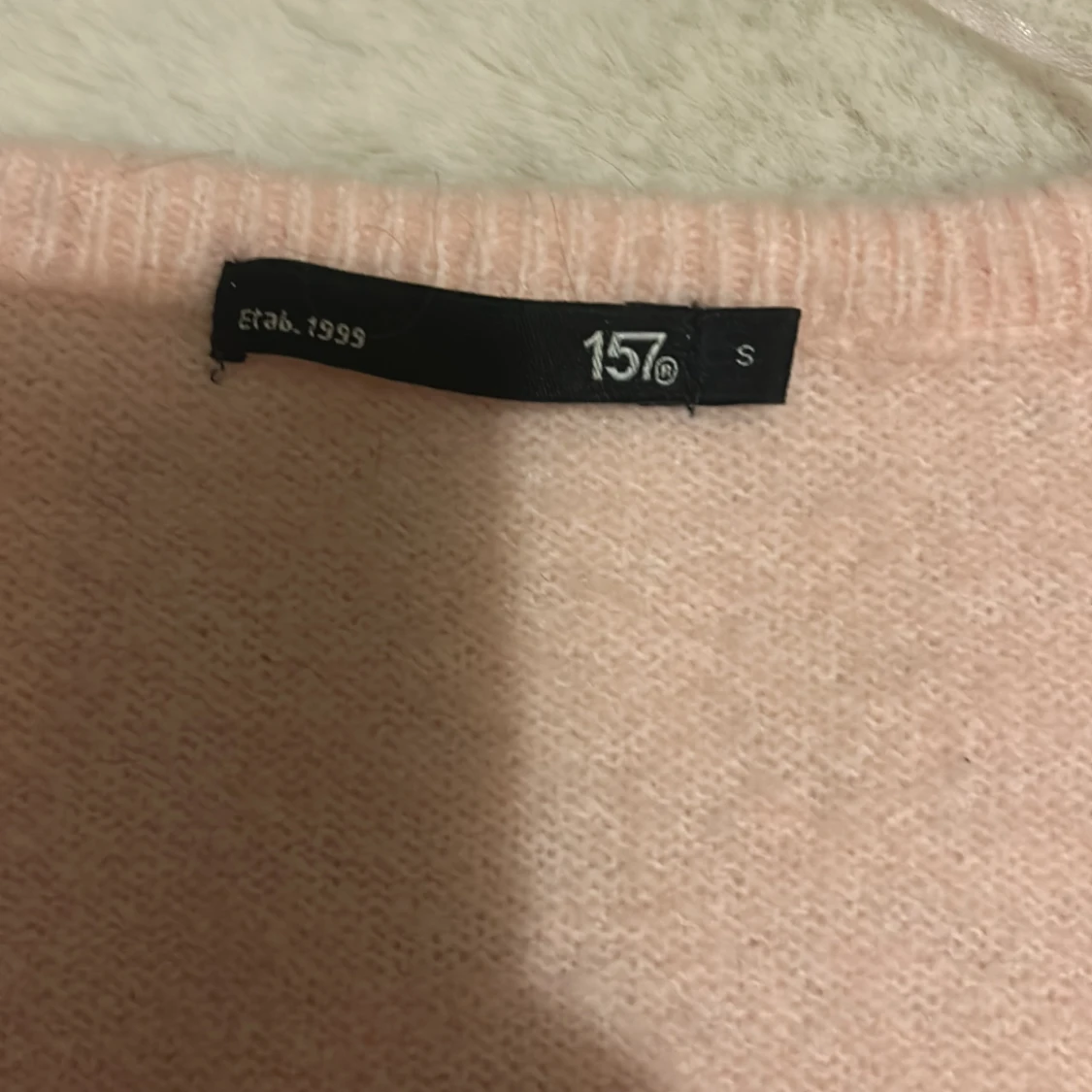 Ljusrosa kofta från 157 - 2