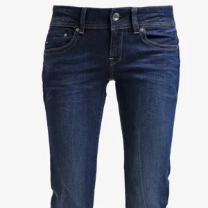 Mörkblå bootcut jeans från g star - Jätte snygga lågmidjade bootcut jeans från g star!!