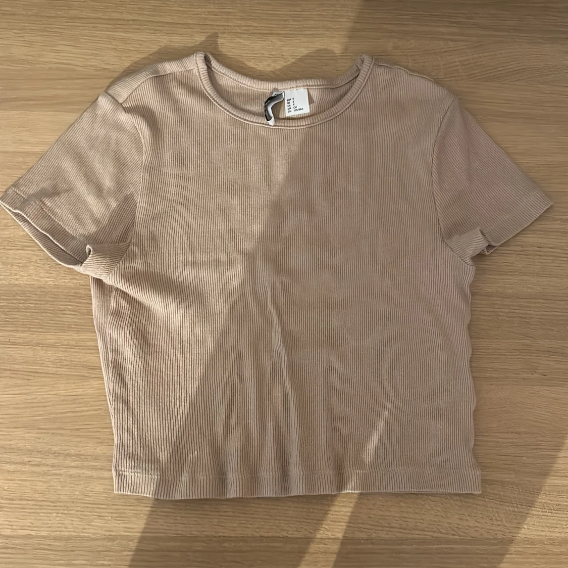 Beige ribbad topp från H&M