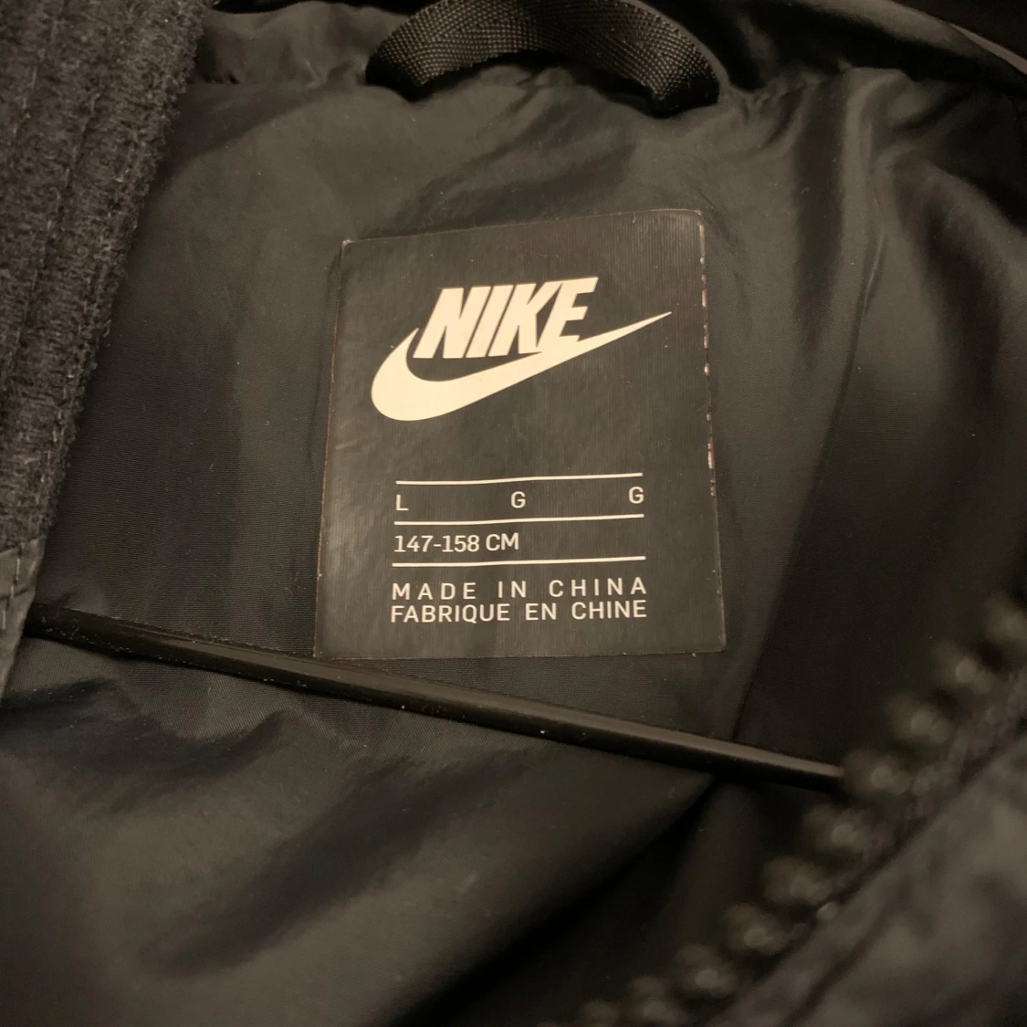 Svart dunjacka från Nike - 2