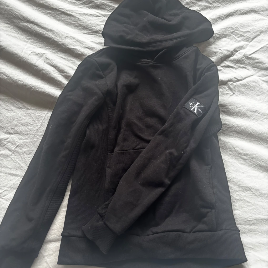Svart hoodie från Calvin Klein Jeans