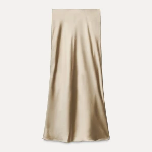 Zara satin kjol - Satin/ blank kjol från zara i brun/beige färg. Nyskick.