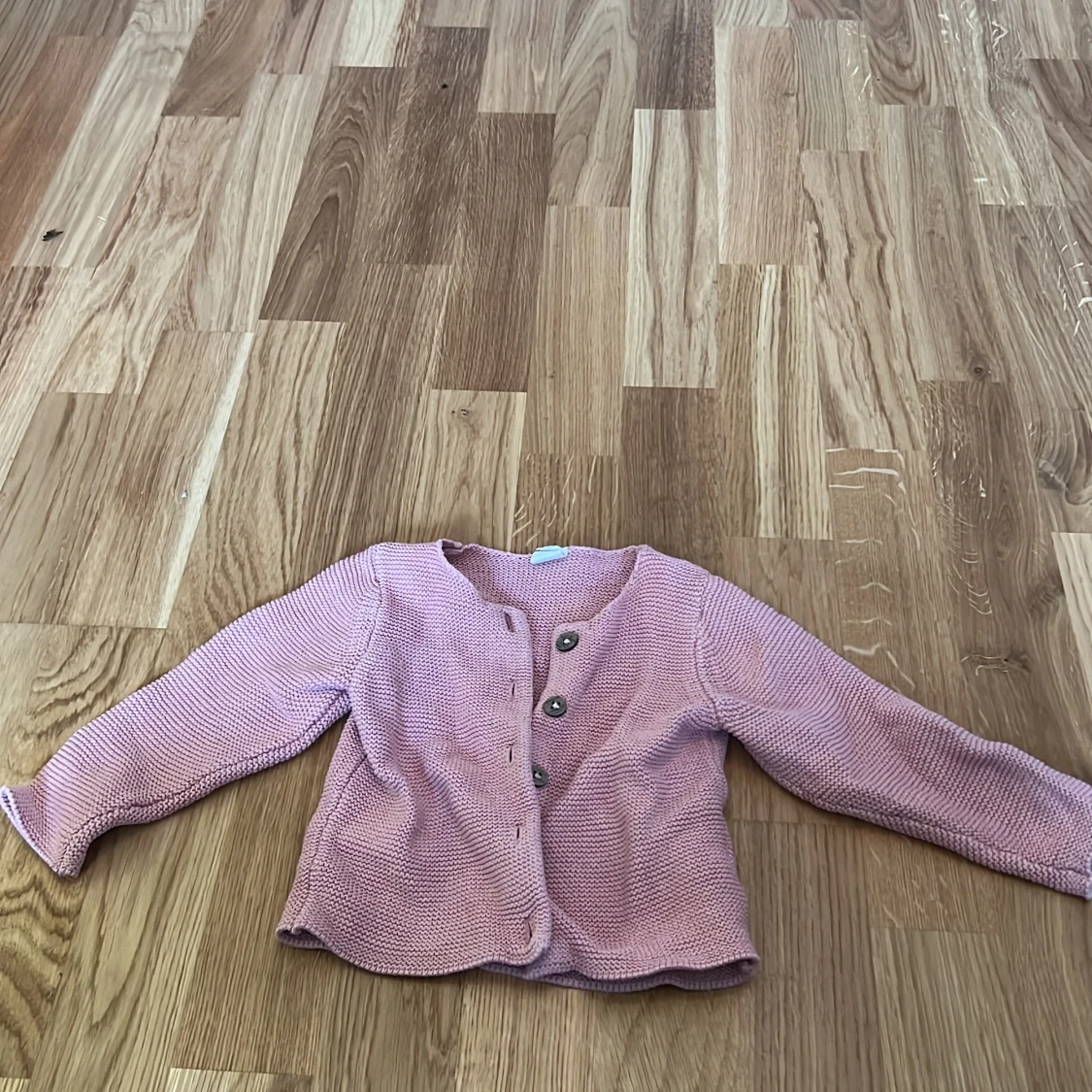 Rosa stickad kofta från H&M