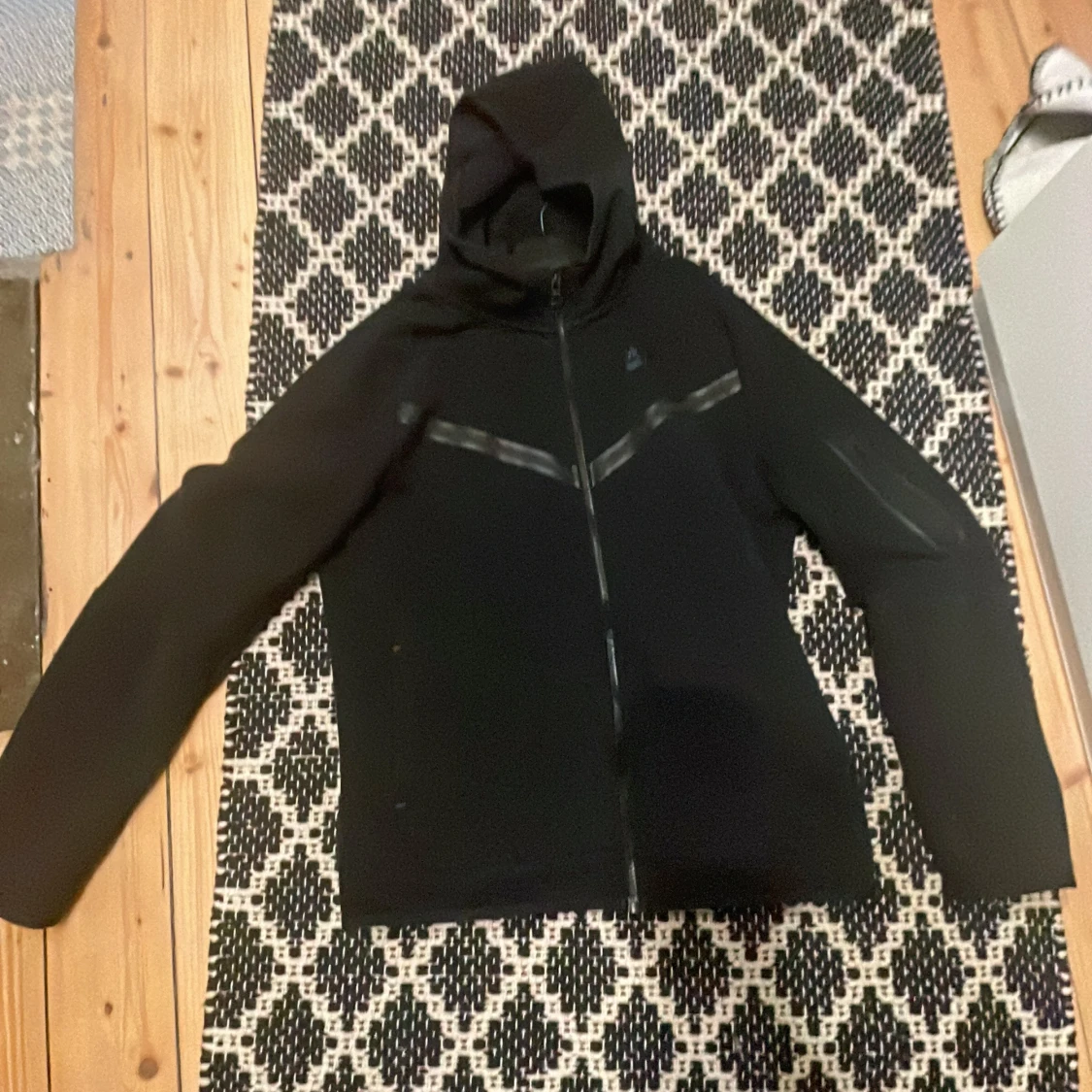 Svart fleecejacka från Nike