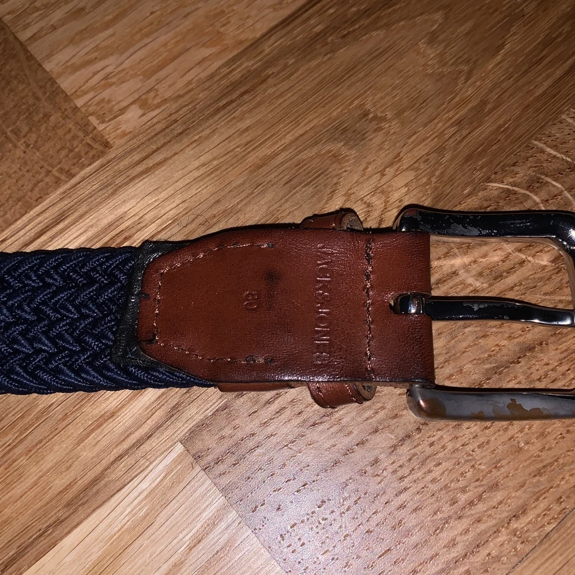 Blått flätat bälte storlek 80 cm - 92