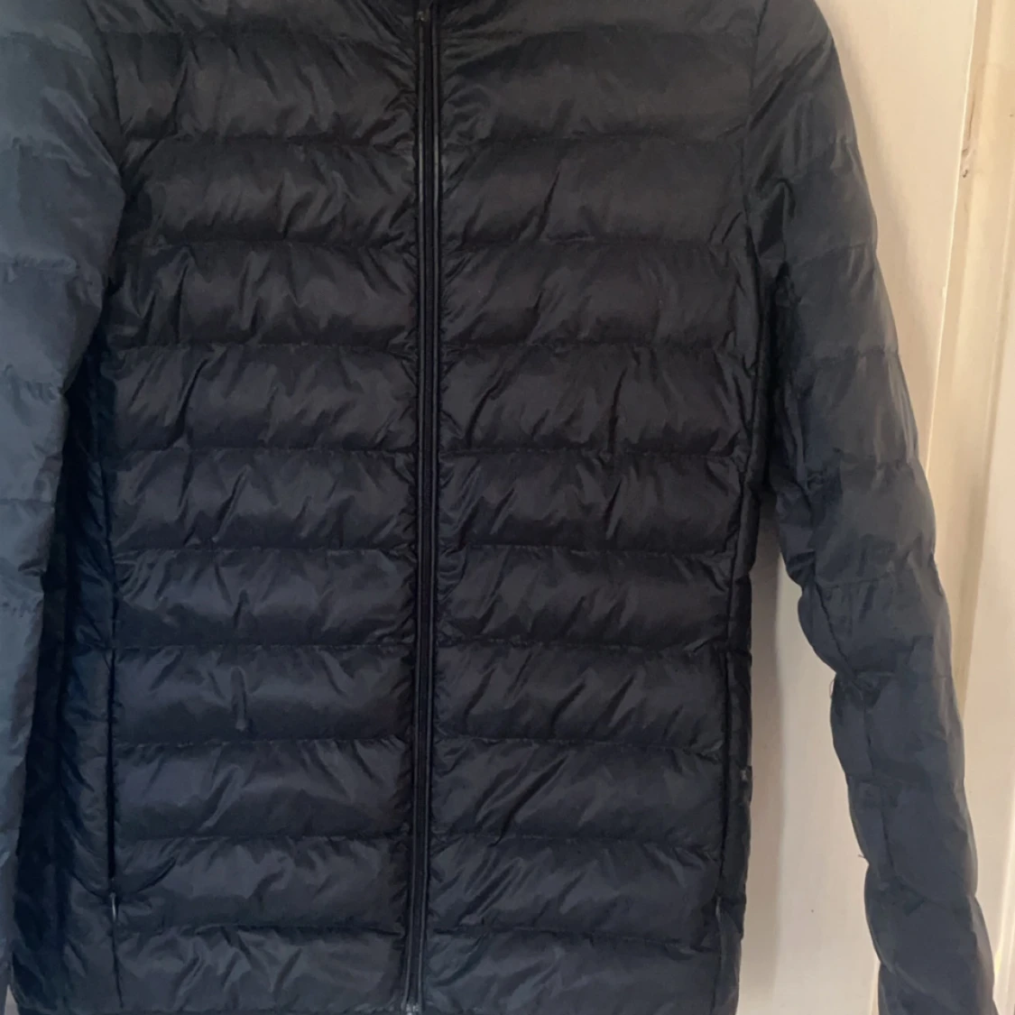 Svart quiltad dunjacka