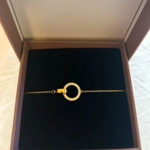 Guldarmband  - Super fint guldarmband från Edblad. Helt oanvänt med original förpackningen kvar.