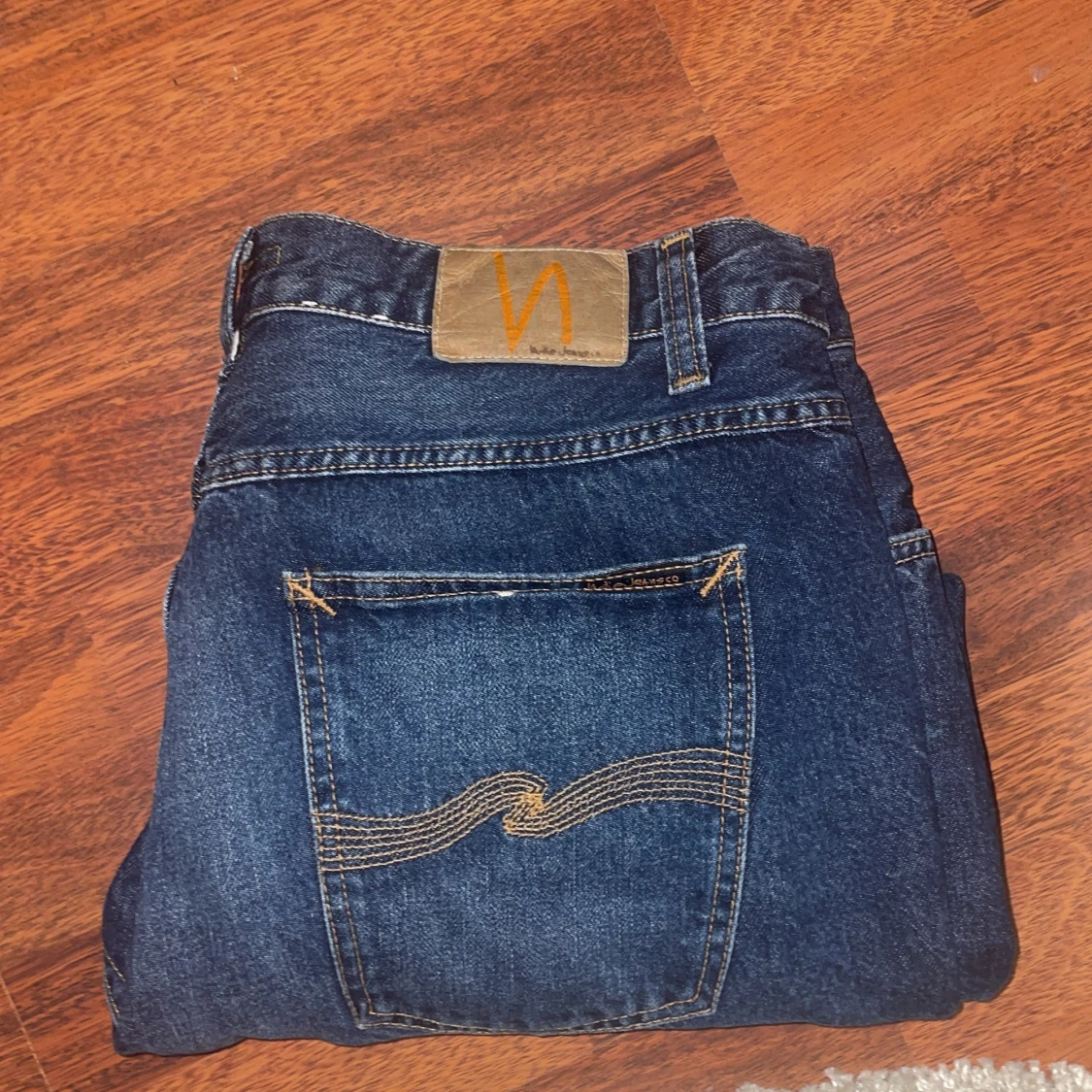Mörkblå jeans från Nudie Jeans (Sitter som 33)