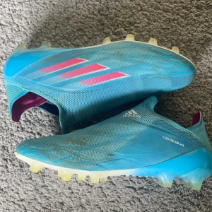 Adidas X speedflow + AG - Storlek 40 2/3, bra skick, nypris 3099kr