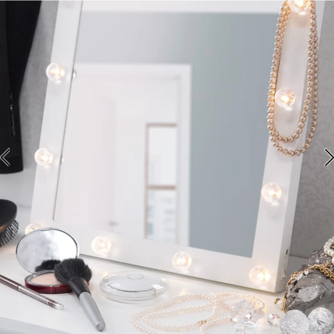 Sminkspegel med belysning