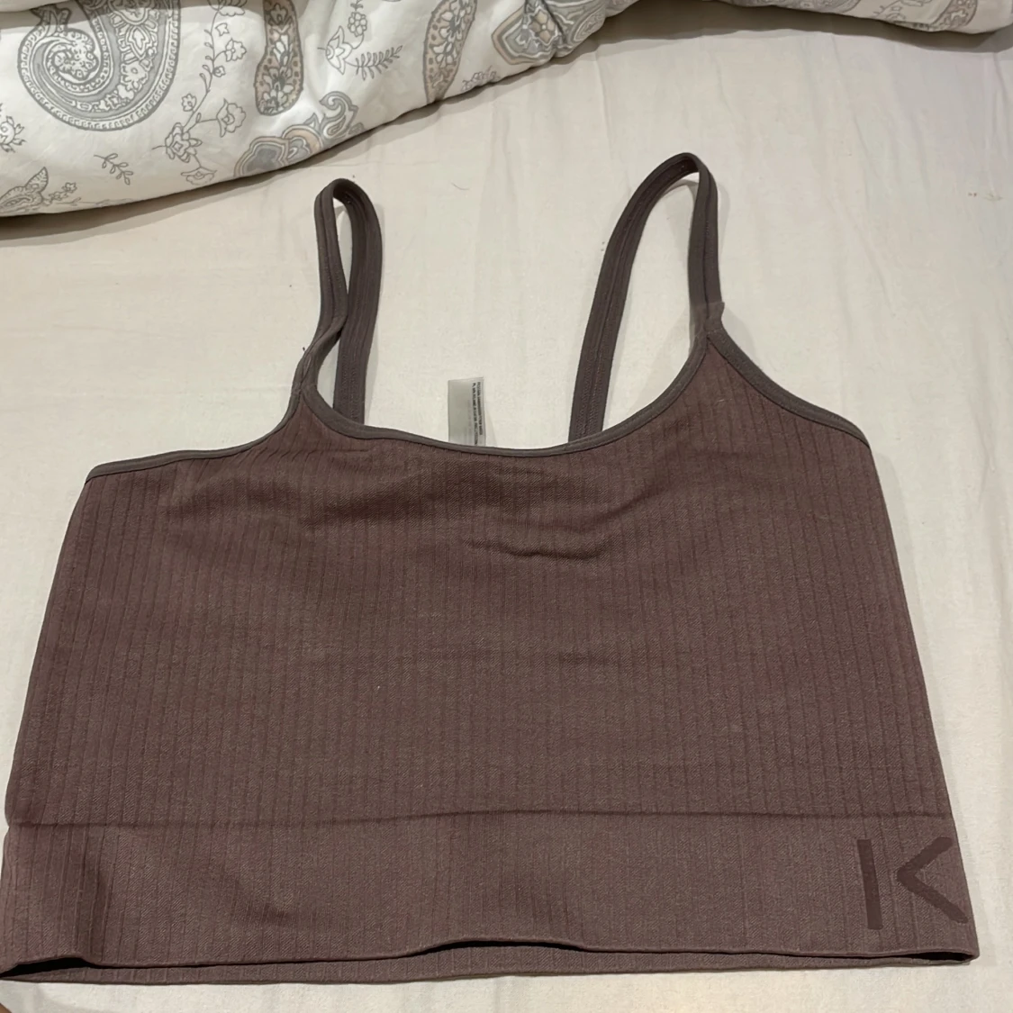 Brun ribbad linnetopp från Kappa