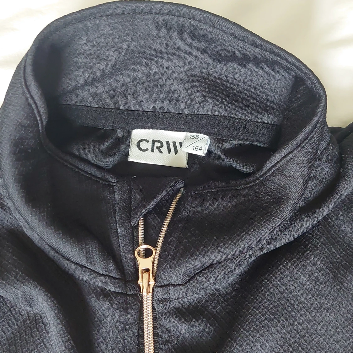 Svart tröja med dragkedja från CRW - 91