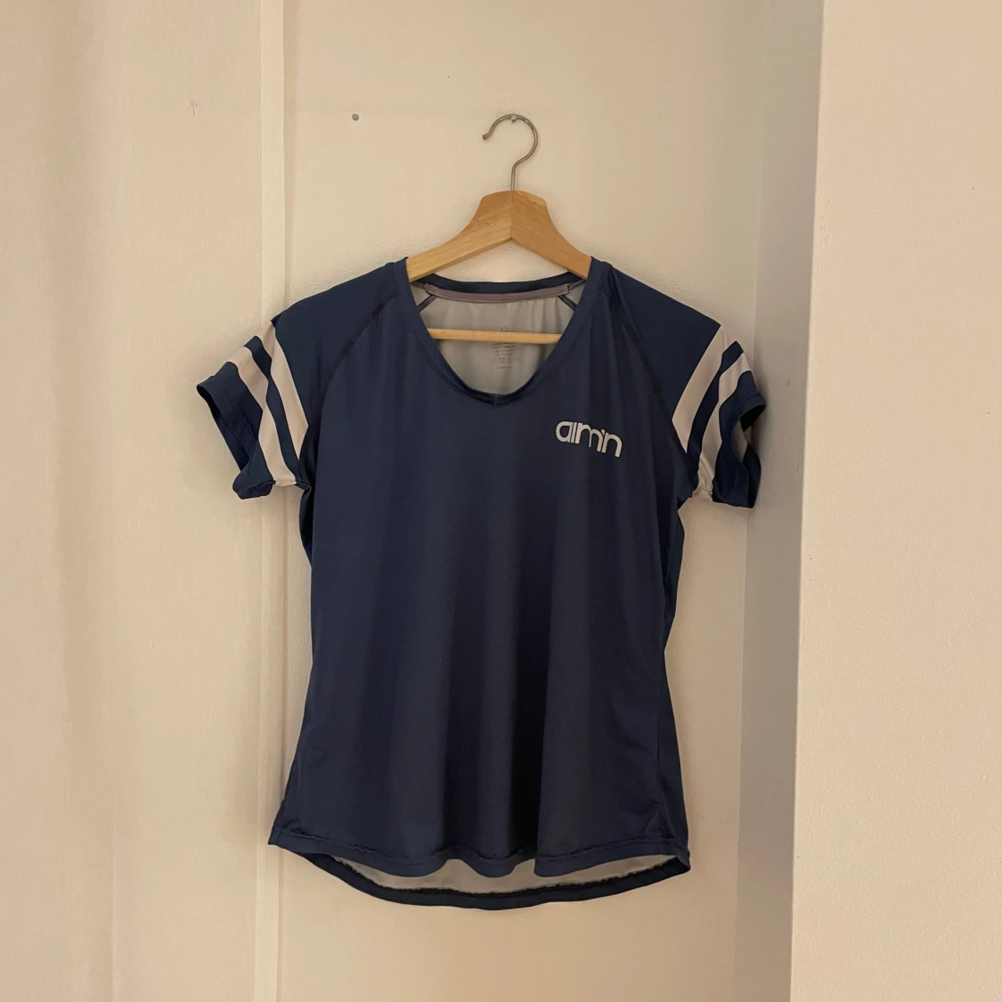 Blå sporttopp från Aim'n