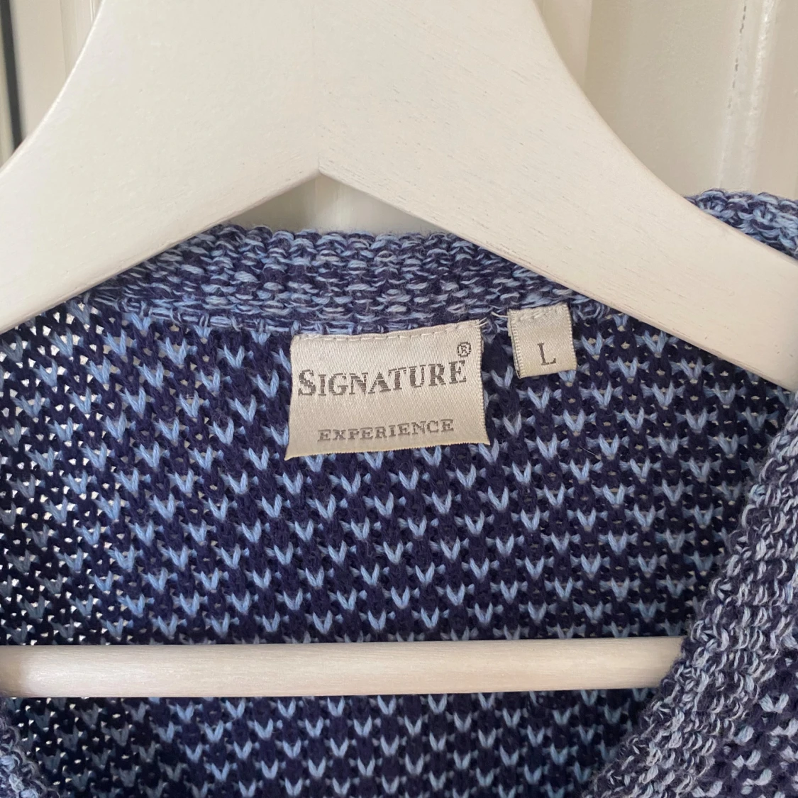 Stickad blå kofta  - 91