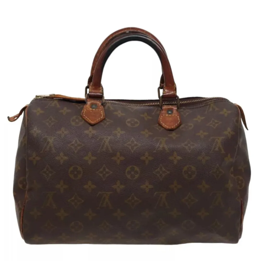 Louis Vuitton Speedy 30. Ett måste i väskkollektionen! Bra storlek för både vardagsbruk och resor. Perfekt att använda som skol-/arbetsväska. Speedy ger en touch av lyx och stil till varje outfit.. Väskor.