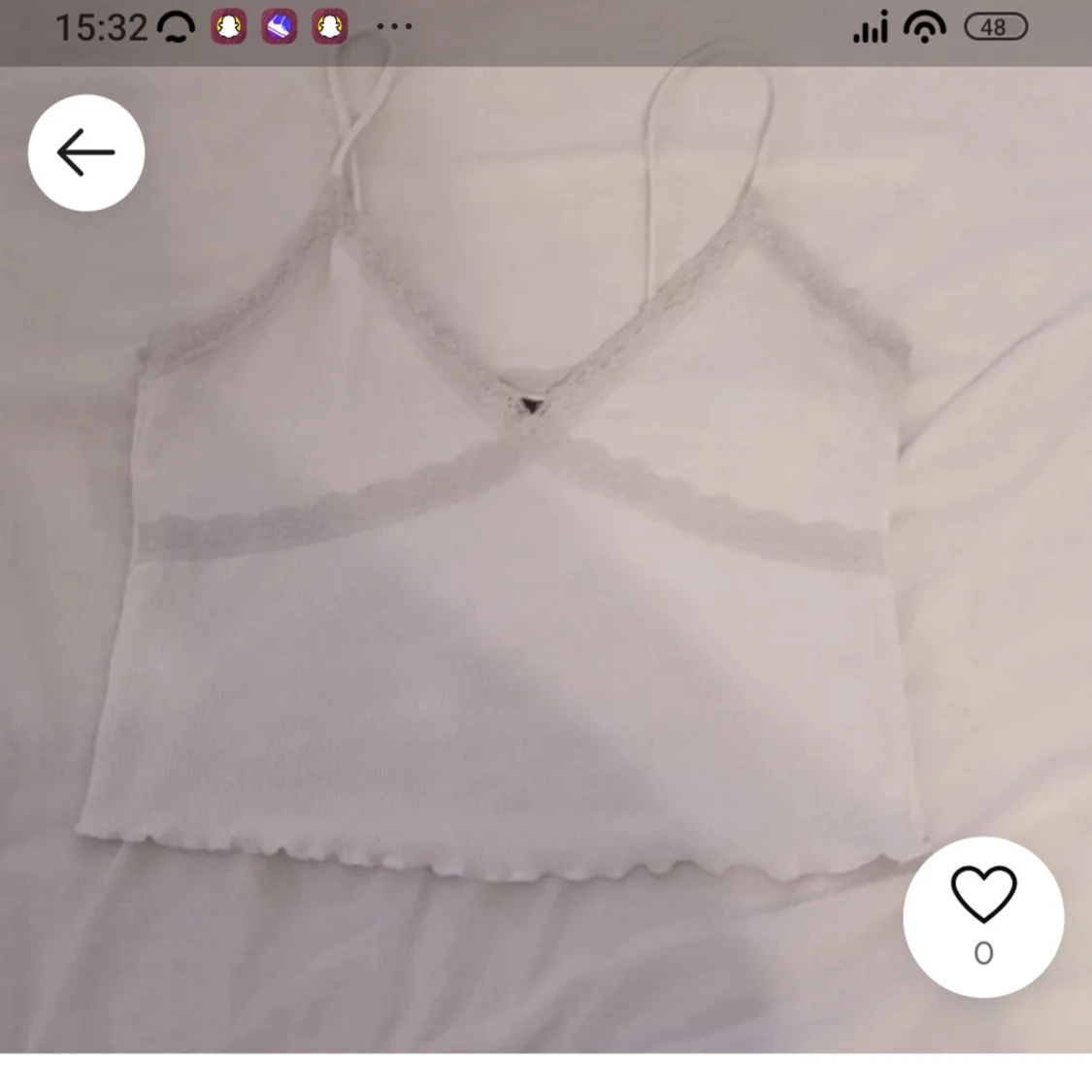 Vit spetskantad linnetopp