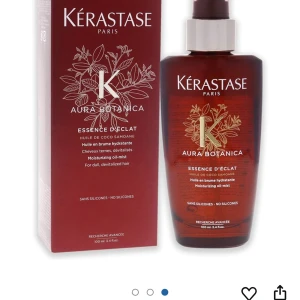 Kérastase Aura Botanica Essence D'Éclat - Fuktgivande oljemist för glanslöst och livlöst hår. Innehåller samoansk kokosolja och är fri från silikoner. Perfekt för att ge håret en naturlig glans och mjukhet.