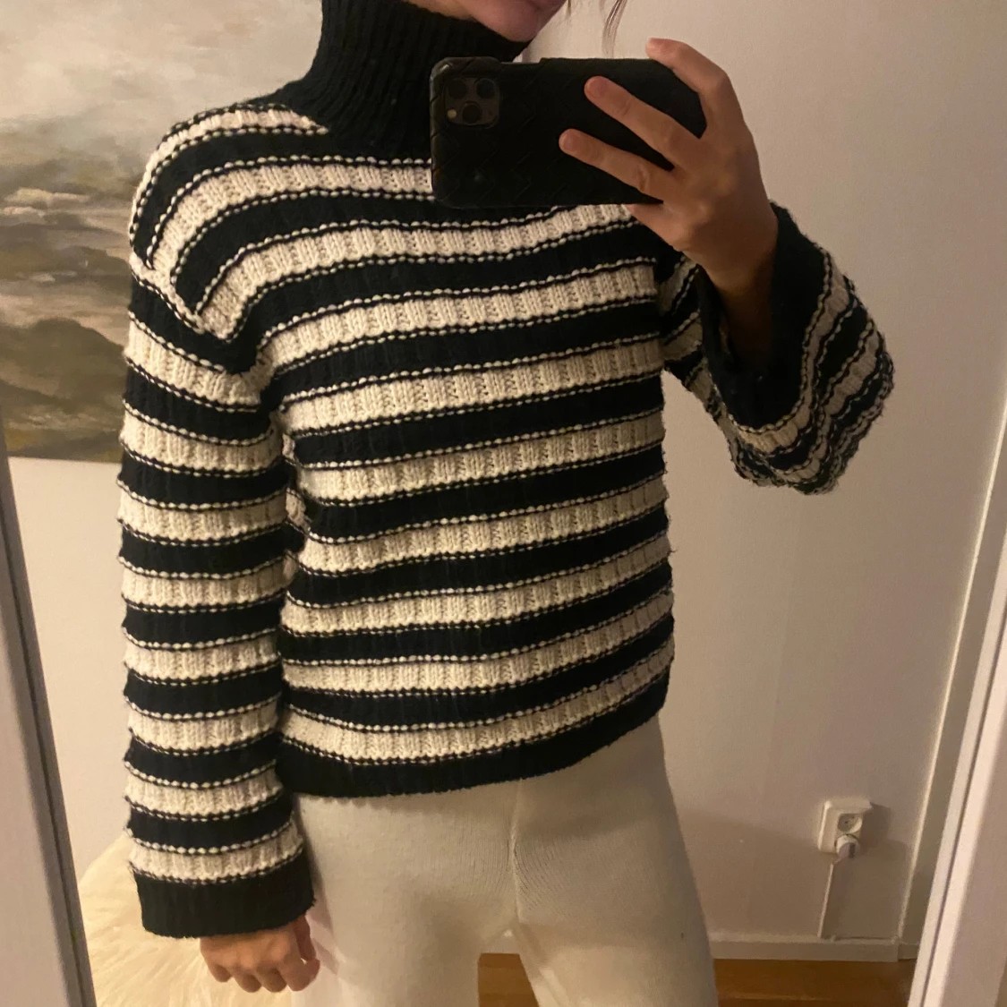 Randig stickad polotröja