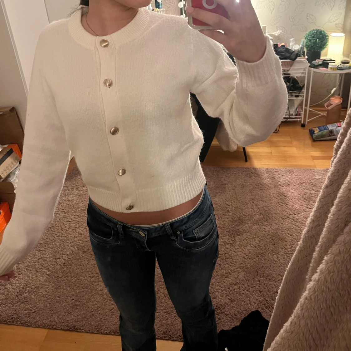 Vit kofta med knappar