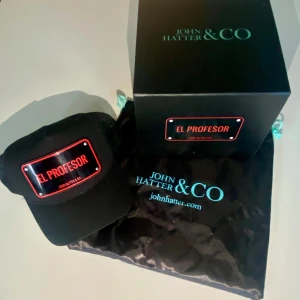 johnhatter & com - En keps i bra skick andvänt fåtals gånger
