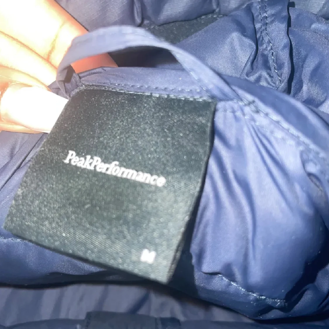 Mörkblå dunjacka från Peak Performance - 91