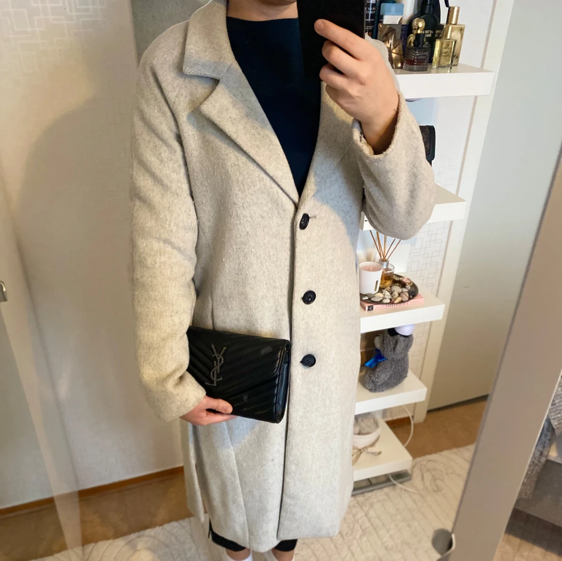 Beige kappa med knappar