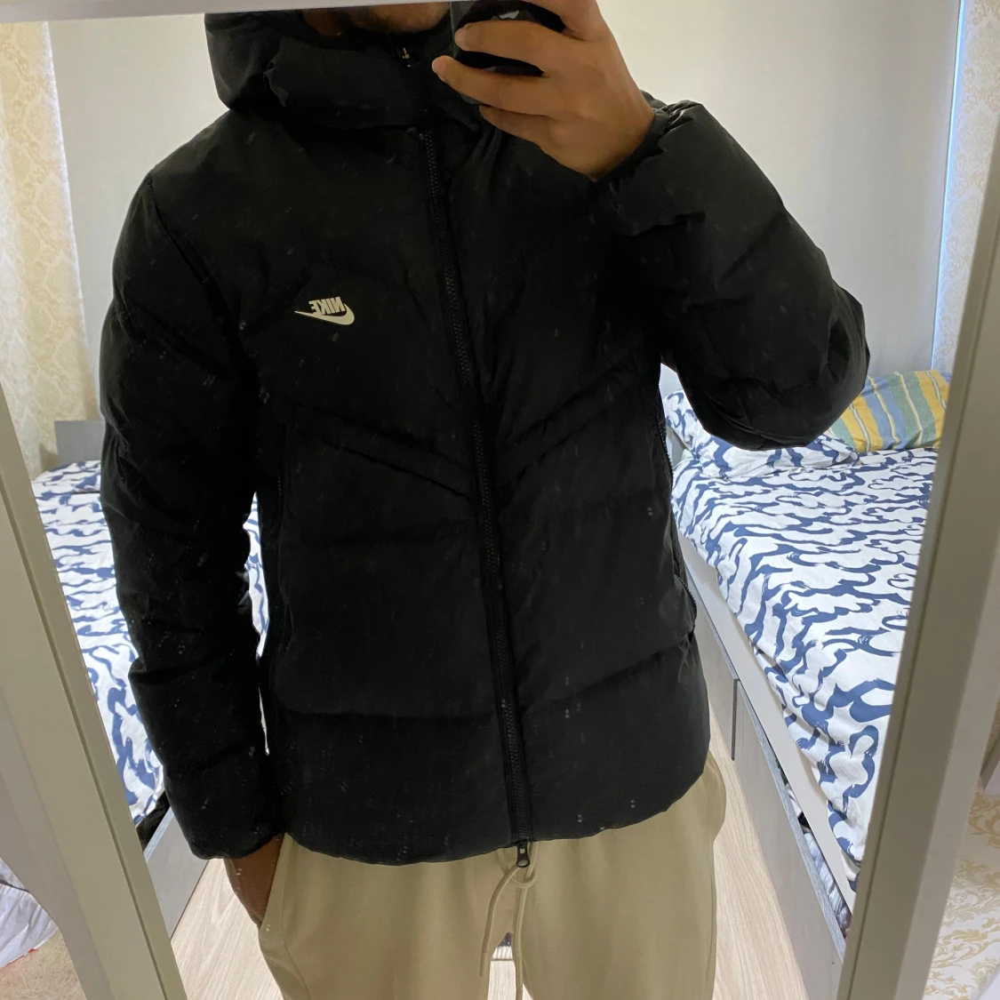 Svart dunjacka från Nike - 91