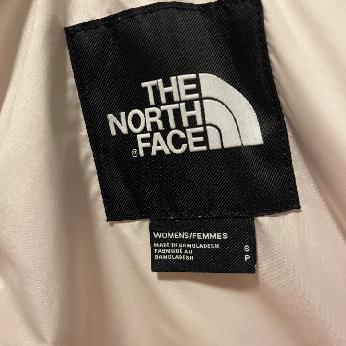 Vit pufferjacka från The North Face - 90