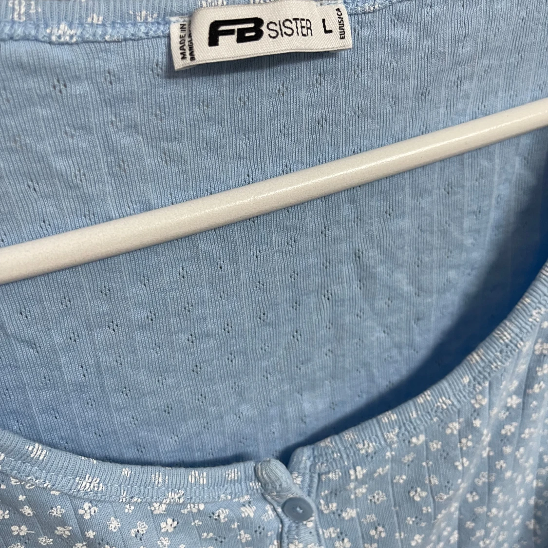 Blå blommig topp från FB Sister - 90