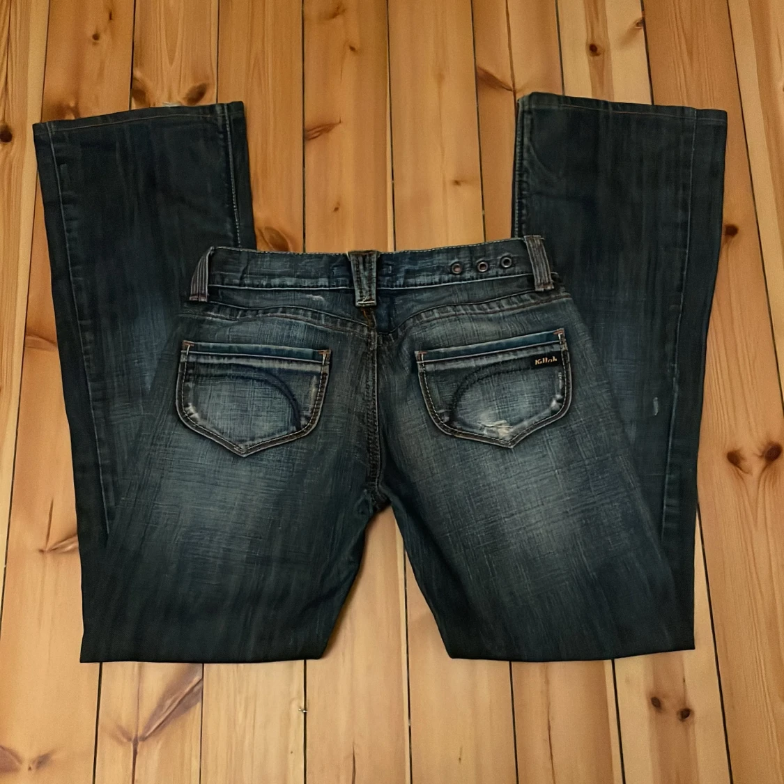 Mörkblåa lågmidjade bootcut jeans i storlek 26 - 91