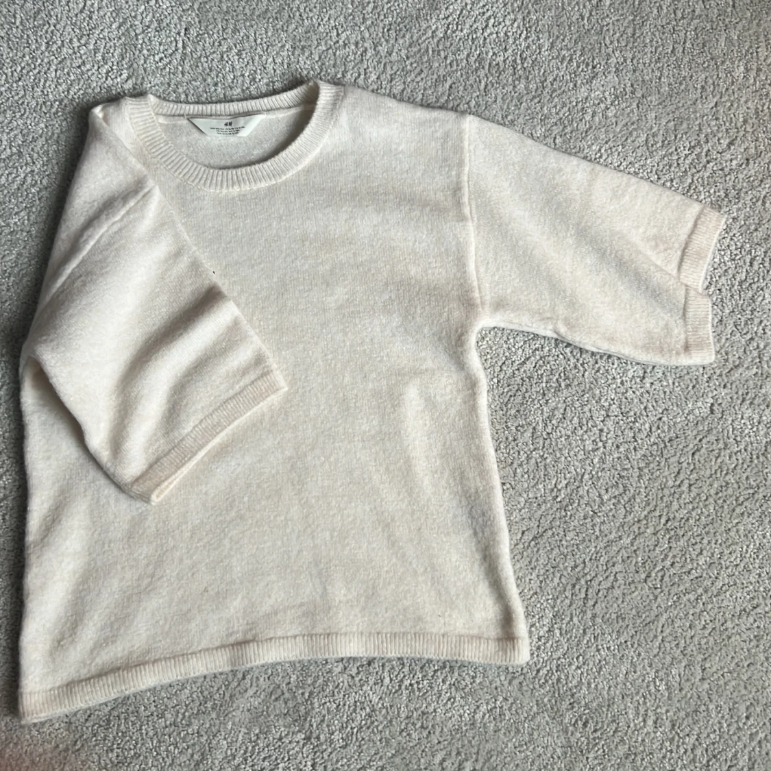 Stickad kortärmad tröja - 90