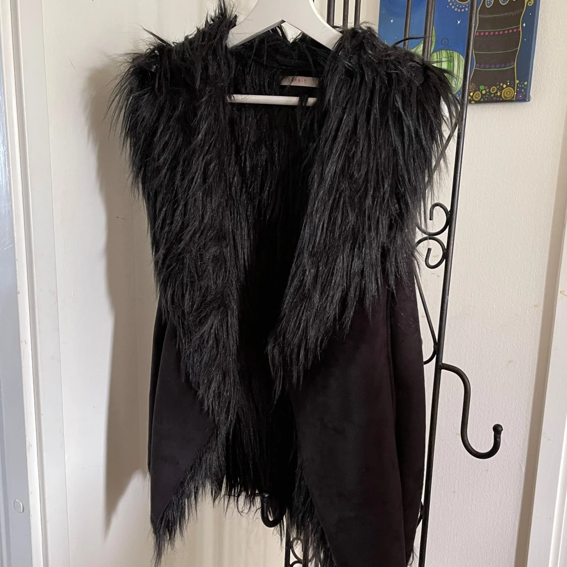 Svart päls väst