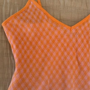 Orange top - Orange and pink cropped tank. Never worn. 