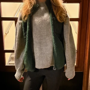 Grön teddyväst - Medium