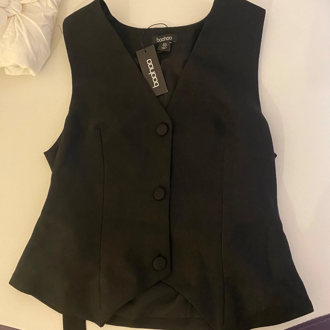Svart topp väst från Boohoo
