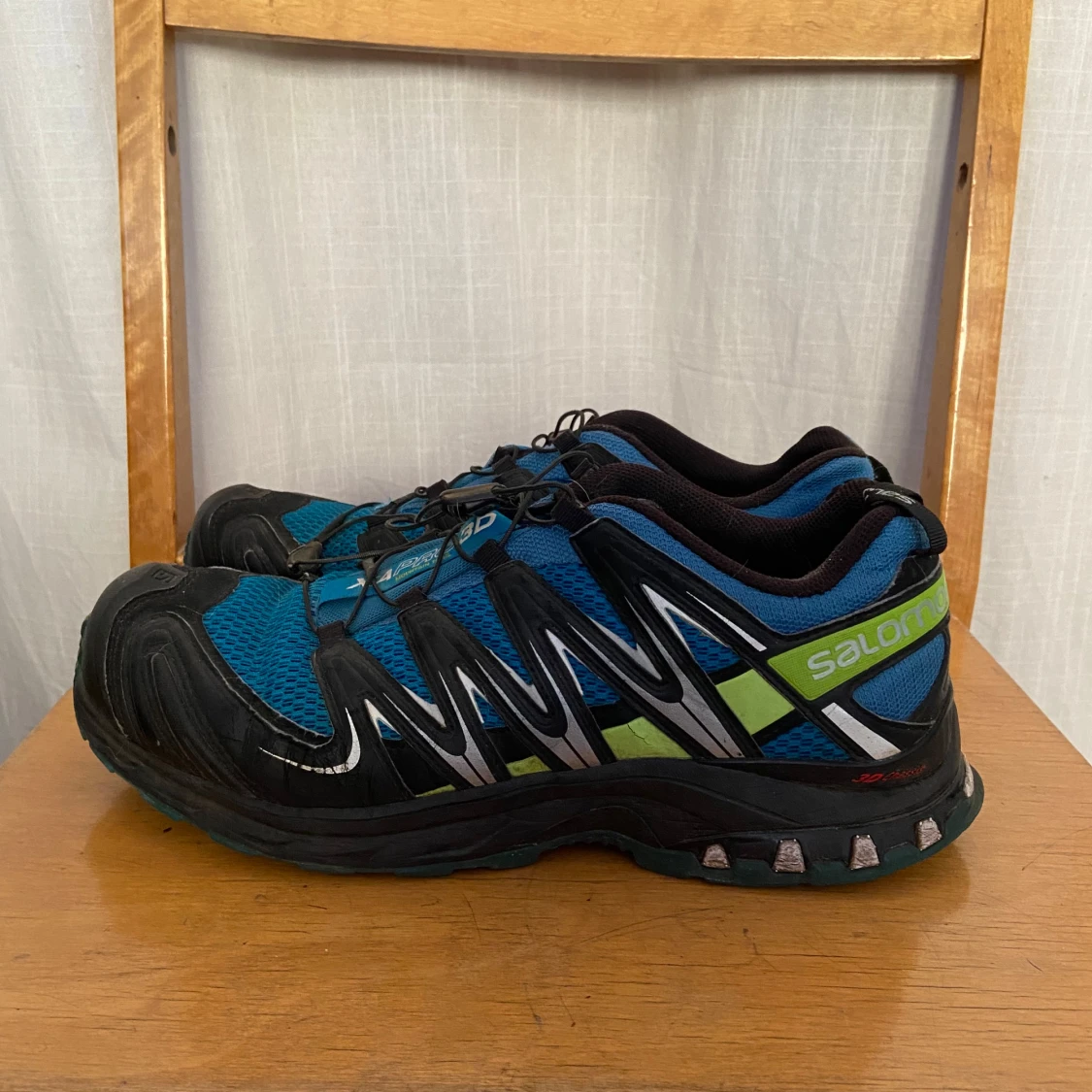 Blå och svarta löparskor från Salomon - 2