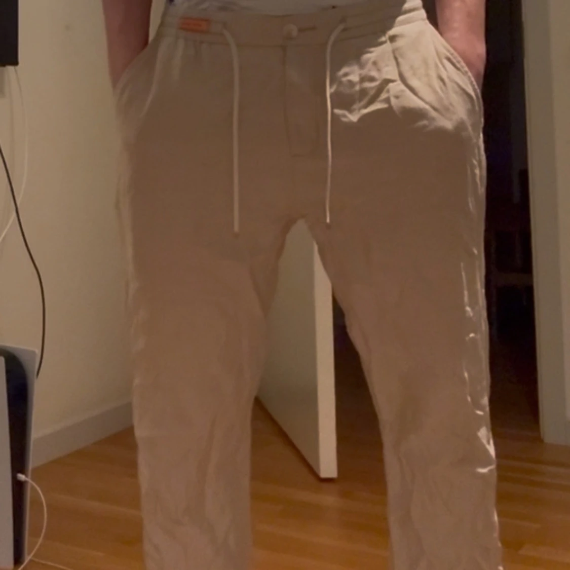 Beige linnebyxor med snörning - 1