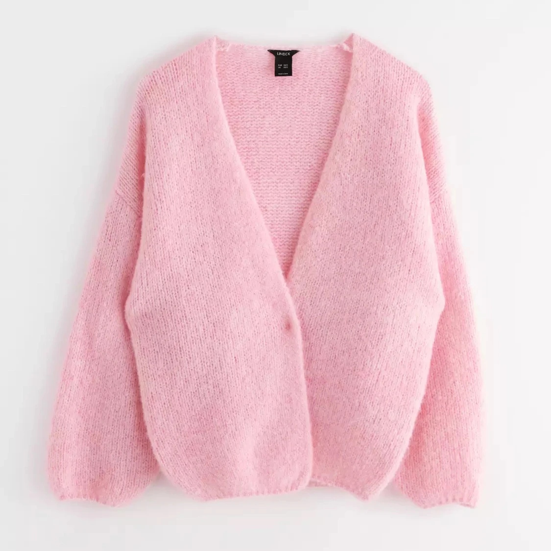 Rosa stickad kofta från Lindex