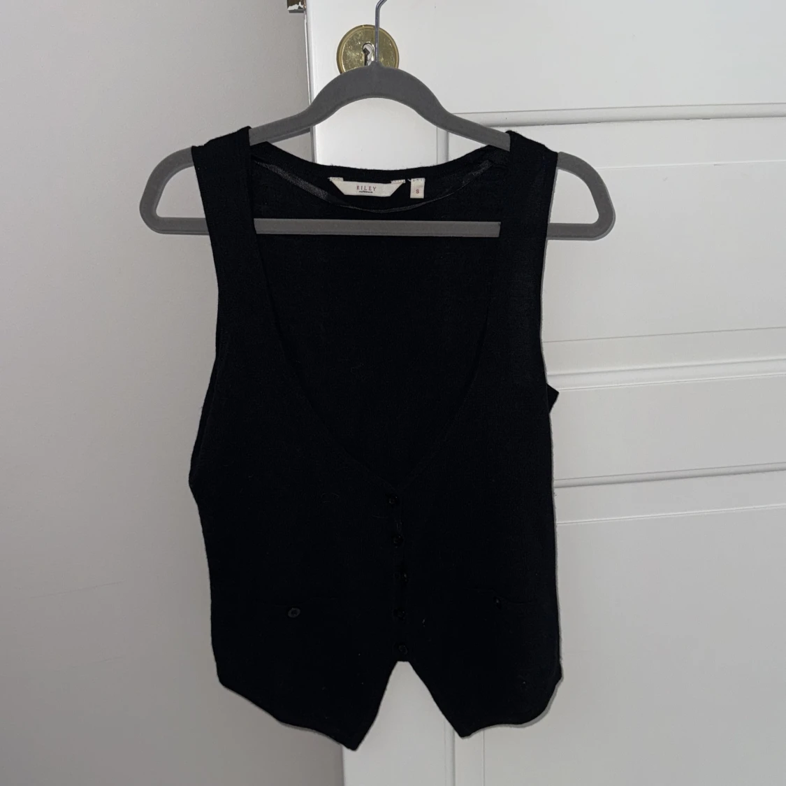 Svart väst från Riley