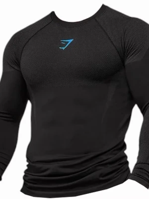 Gymshark onyx v5 - Säljer en svart långärmad onyx från Gymshark med blå logga på bröstet. Tröjan är tight fit, har rund halsringning och är tillverkad i ett stretchigt funktionsmaterial som andas. Perfekt för gymmet eller annan träning. Otroligt ovanligt och såld i ett begränsat antal i endast ett drop!