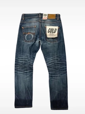 Nudie Jeans Grim Tim Dry Selvedge - Storlek 30/28. Dessa talar för sig själva. Mått Ytterbenslängd 92cm, midja 38cm. En del av Nudie Jeans Re-Use GOLD.  Skriv bara vid frågor! Öppen för bud.