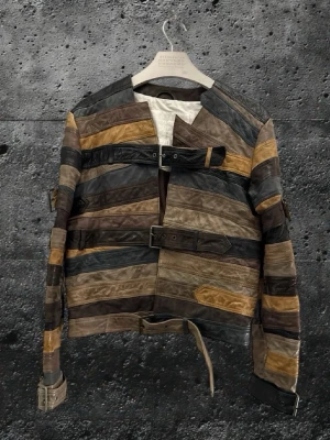 Maison Margiela X h&m belt jacket - Perfect condition with no flaws. The jacket has been extremely well kept and there are truly very few examples available that are even close to this condition. Bag and hanger included. This is one of the most iconic pieces from the Maison Margiela x H&M collaboration. The belt jacket has been worn by the likes of Young Thug and Lil Yachty and is widely recognized as a cult grail in both fashion and music culture. Measurements Length 61 cm Width 51 cm sleeve length 63.5cm