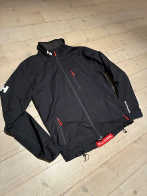 Helly Hansen Jacka - Helly hansen jacka i storlek L. Mycket bra skick!