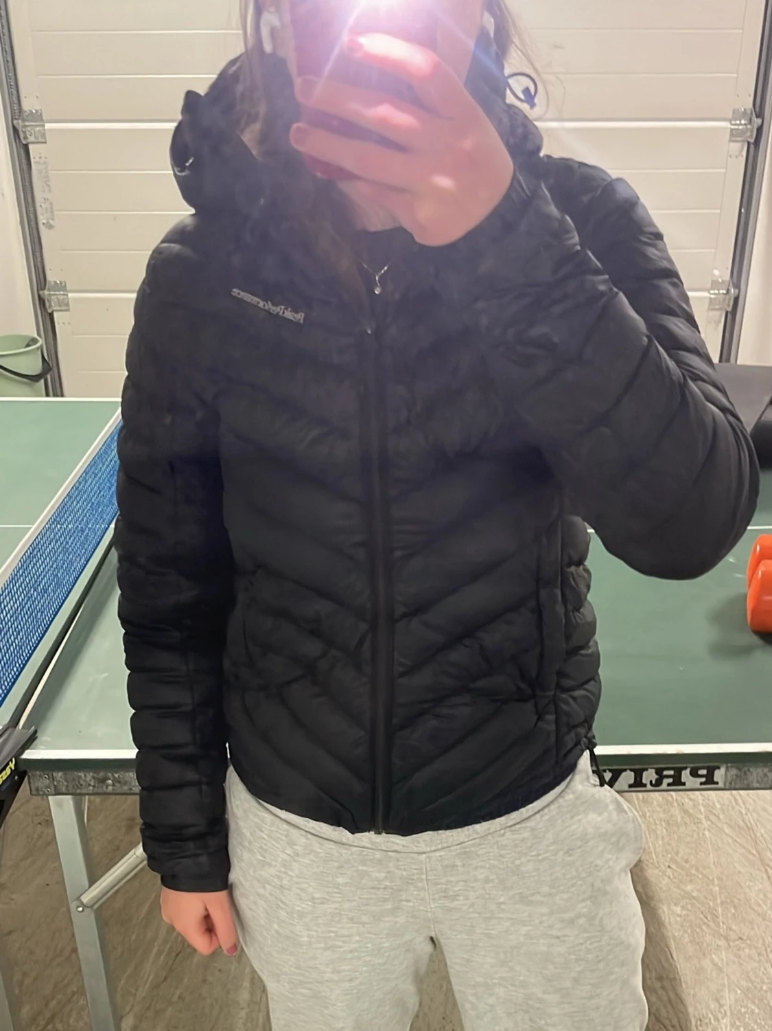 Svart dunjacka från Peak Performance