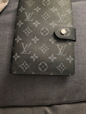 Agenda cover MM - Som ny. Kommer med box.