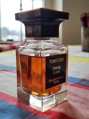 Tom Ford Ébène Fumé Eau de Parfum 50 ml bottle - used, not full - Tom Ford Ébène Fumé Eau de Parfum in a 50 ml bottle - used, not full - see pictures. In good condition, from a clean and tidy home :) for reference, original full bottle costs 2200 kr.