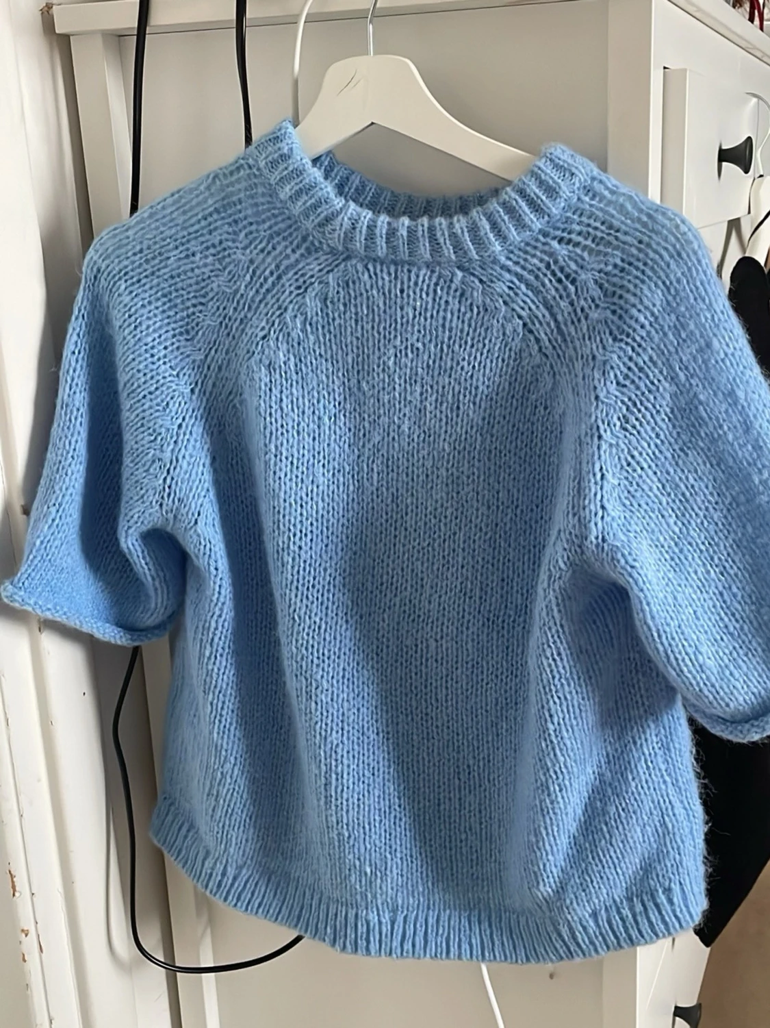 ljusblå stickad tröja