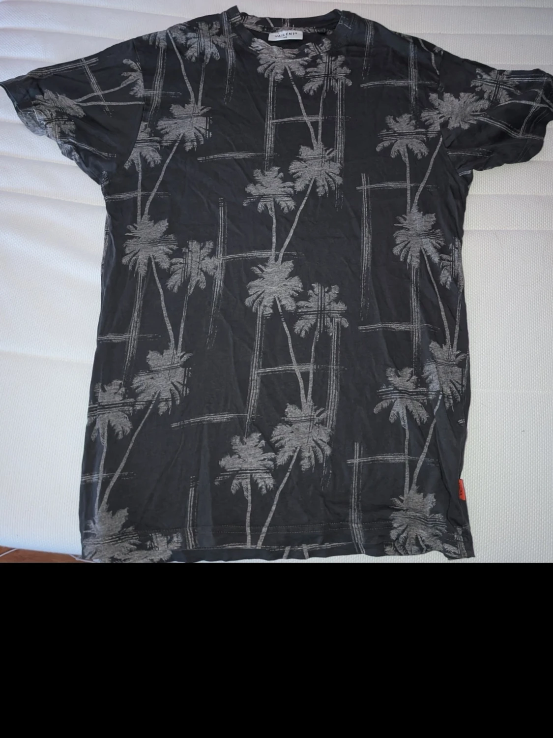 Svart t-shirt med palmtryck
