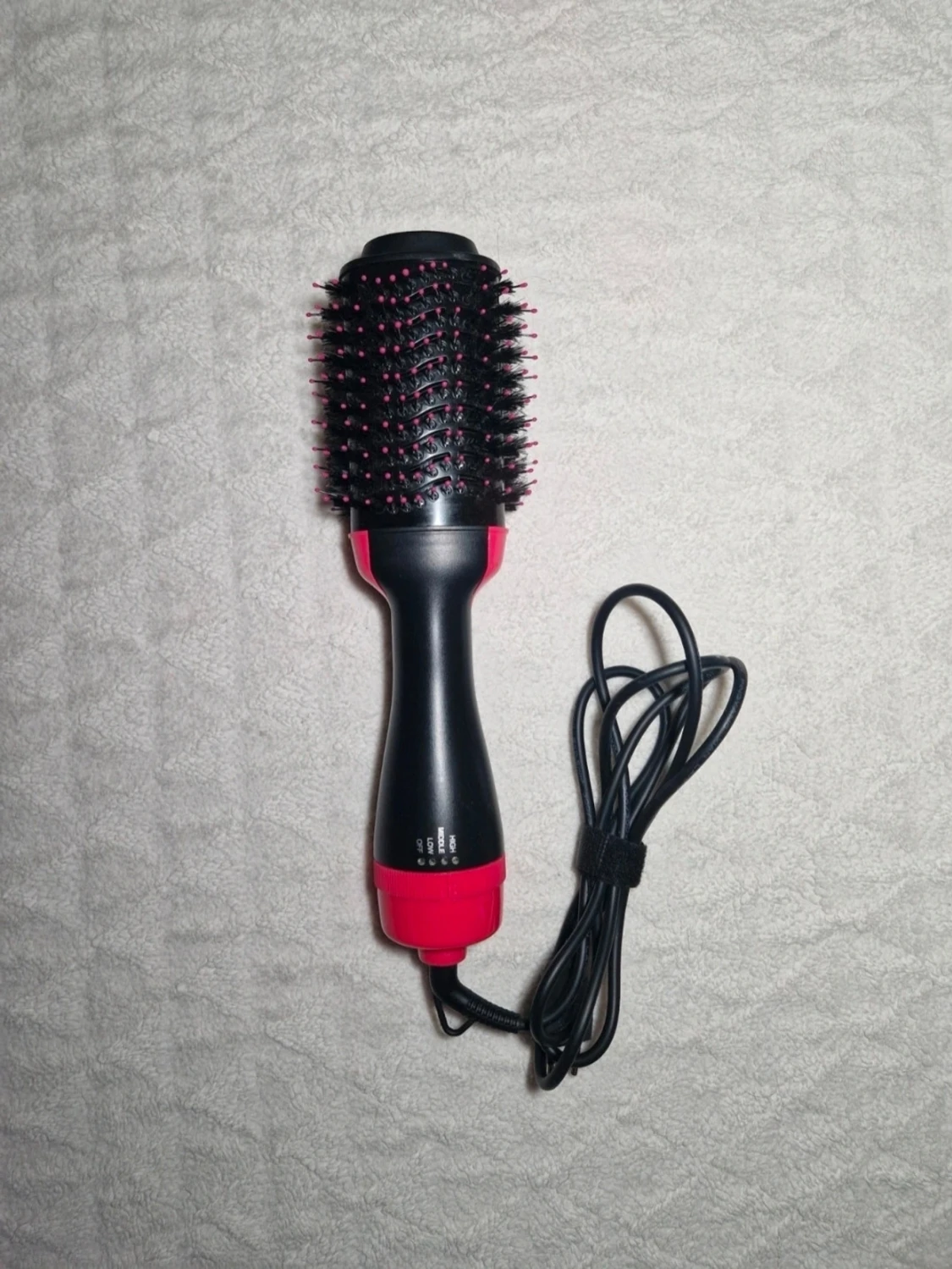 Svart och rosa varmluftsborste