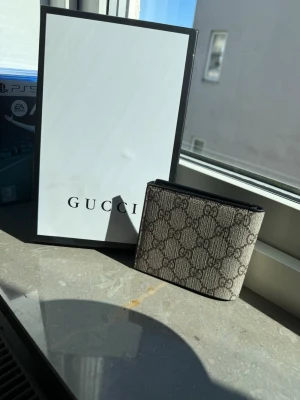 G.ucci plånbok.  - G.ucci olånbok helt ny fraktas inom 24 Tim. 